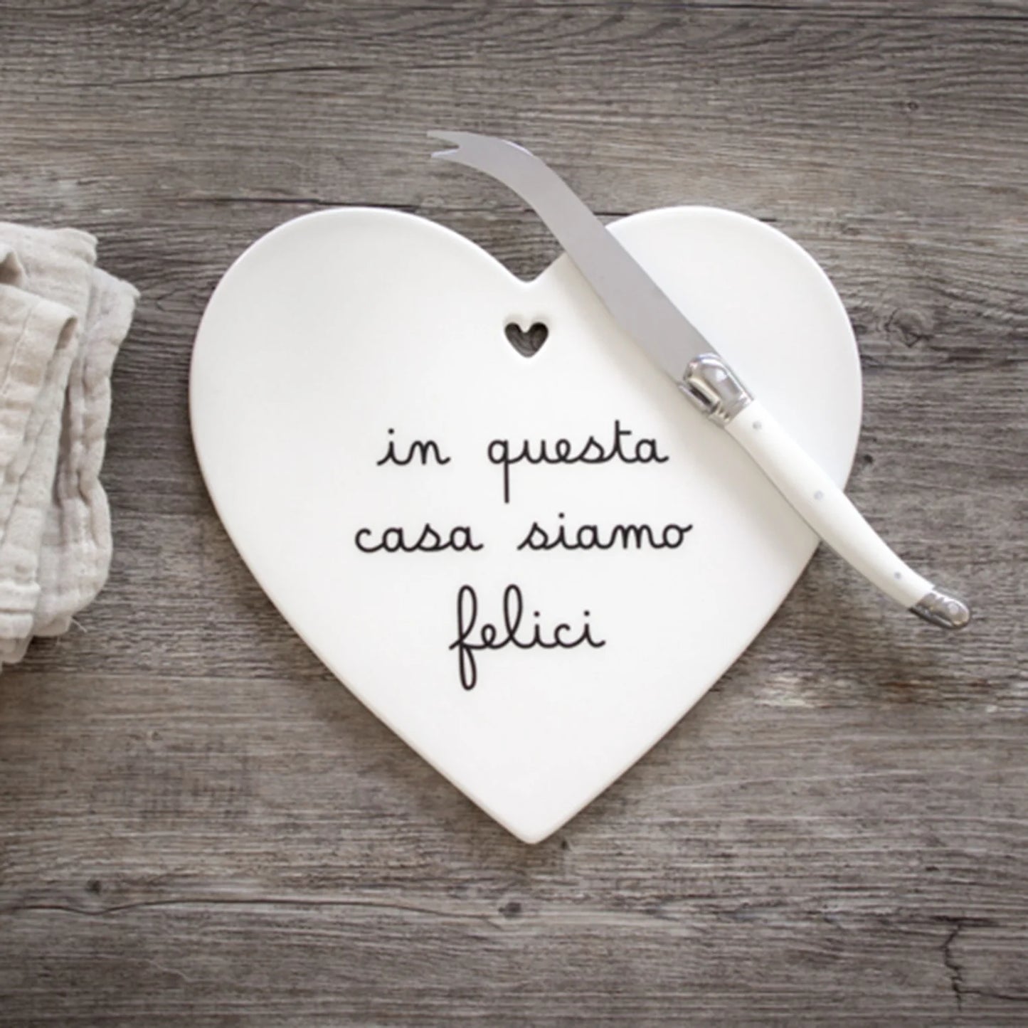 Sottopentola a cuore "in questa casa siamo felici"